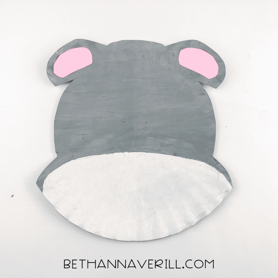 The gray rhino face with pink ear inserts now glued inside the top ear shapes.
