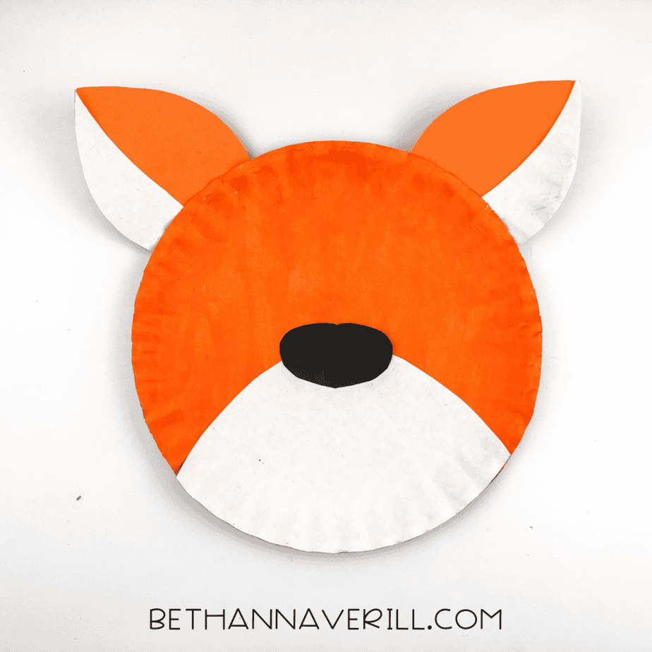 Paper plate tiger craft for kids.