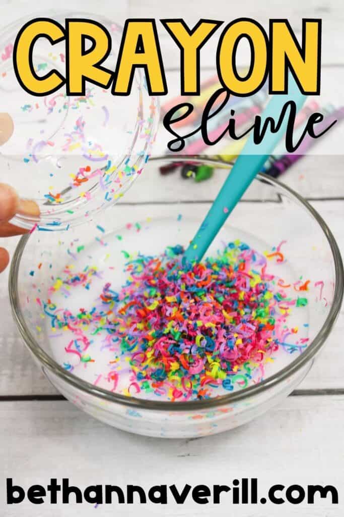 Crayon shavings being poured into a bowl of glue mixture to make colorful DIY crayon slime, with text reading 'Crayon Slime'.