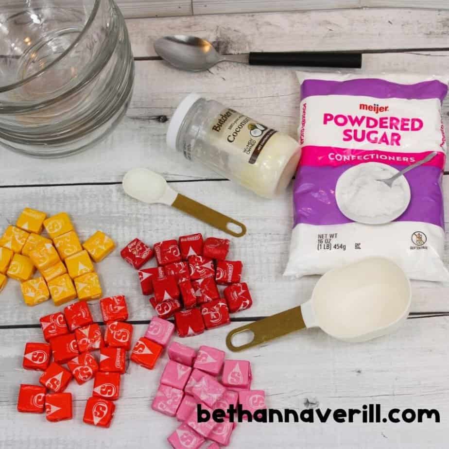 Starburst candies, powdered sugar and coconut oil