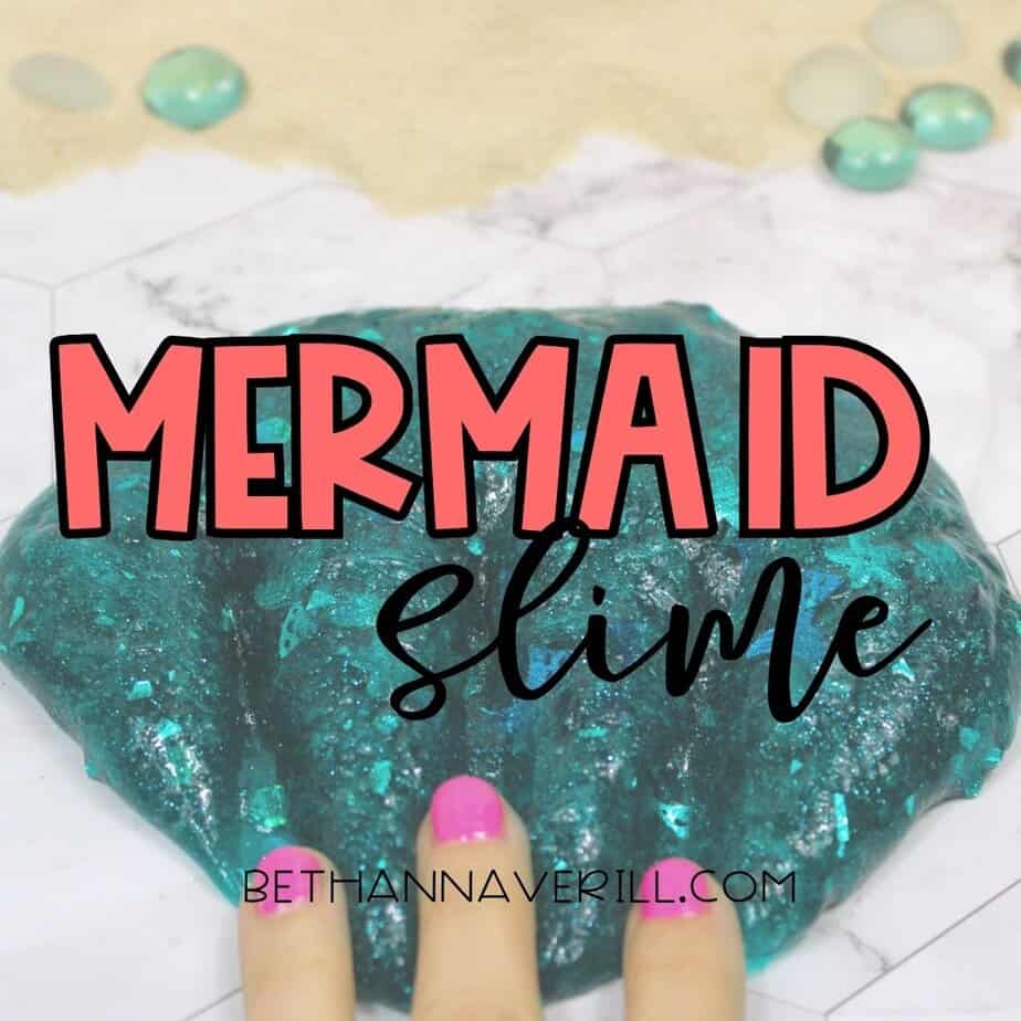 A close-up of teal glitter mermaid slime being pressed by fingers with pink nail polish, set on a tiled surface with scattered decorative glass pebbles. Bold text reads “MERMAID slime” across the center, with “bethannaverill.com” at the bottom.