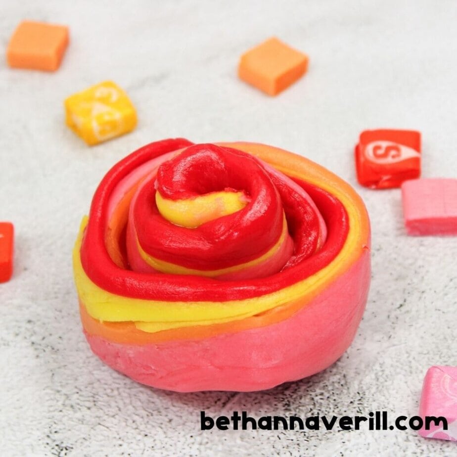 Swirled red and yellow edible Starburst slime