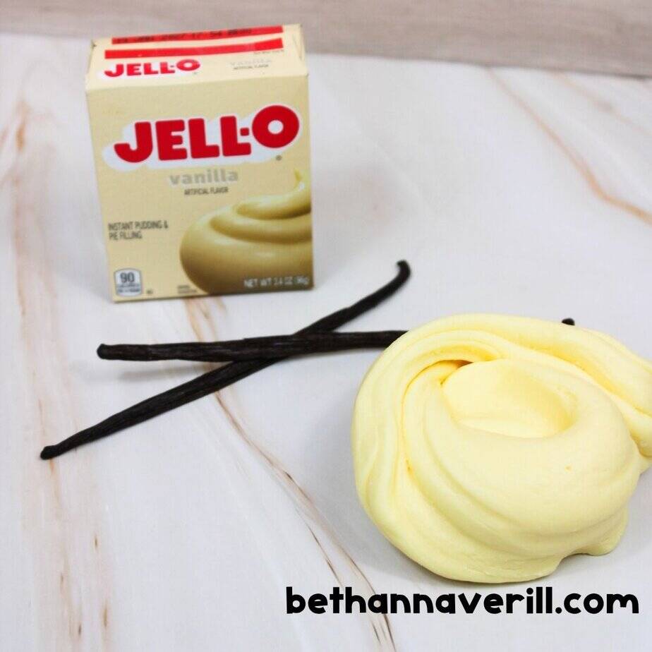 Jello vanilla pudding box next to a swirl of vanilla pudding slime and two vanilla beans on a marble surface. bethannaverill.com branding included.