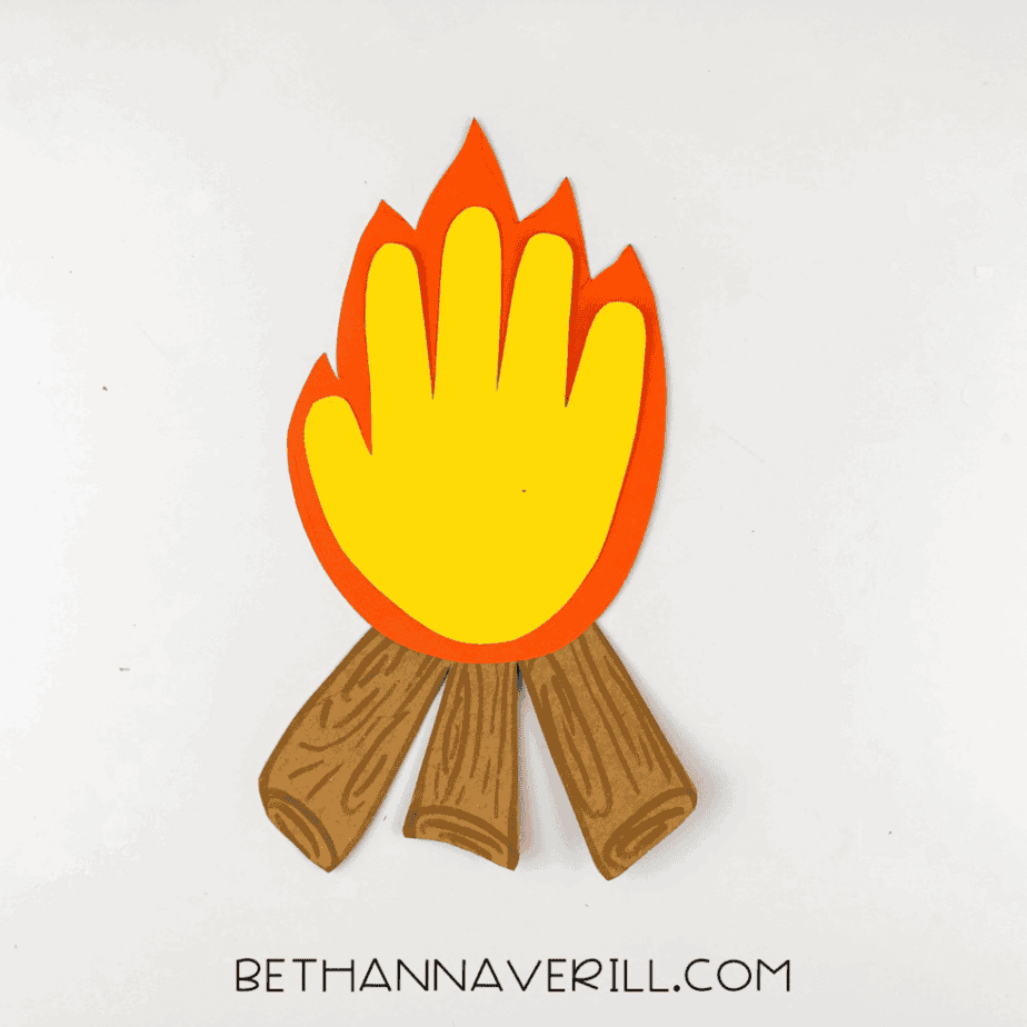 The finished bonfire craft with the flame placed above three logs.