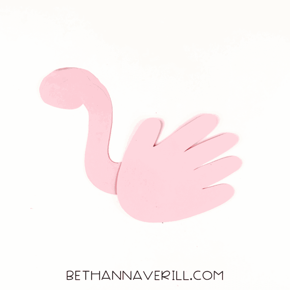 Handprint glued to neck to form base of flamingo.