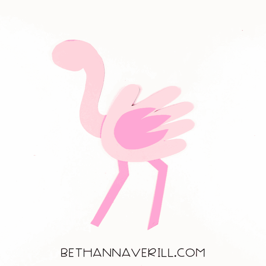 Legs added beneath body to give flamingo its signature stance.