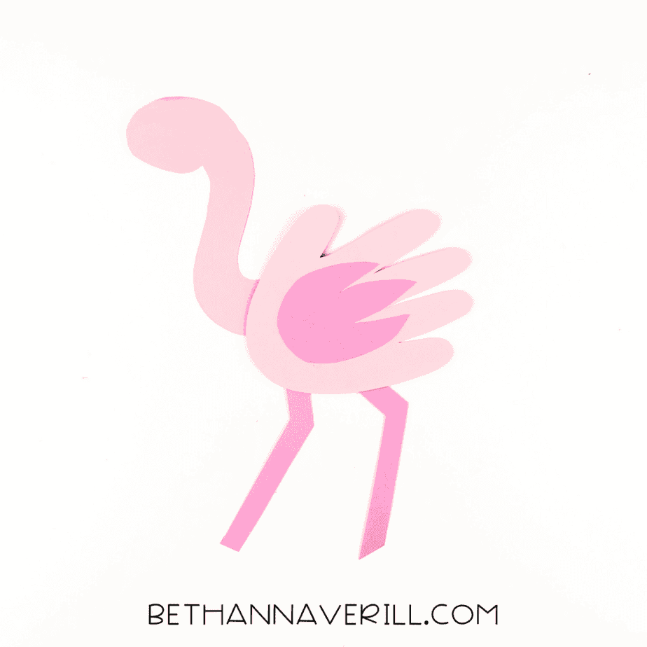 Legs added beneath body to give flamingo its signature stance.