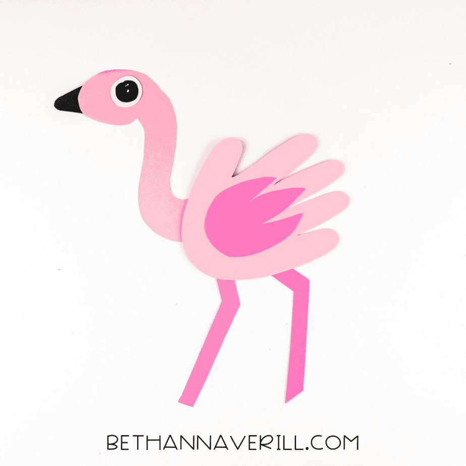 Black triangle glued to tip of flamingo's head for the beak.
