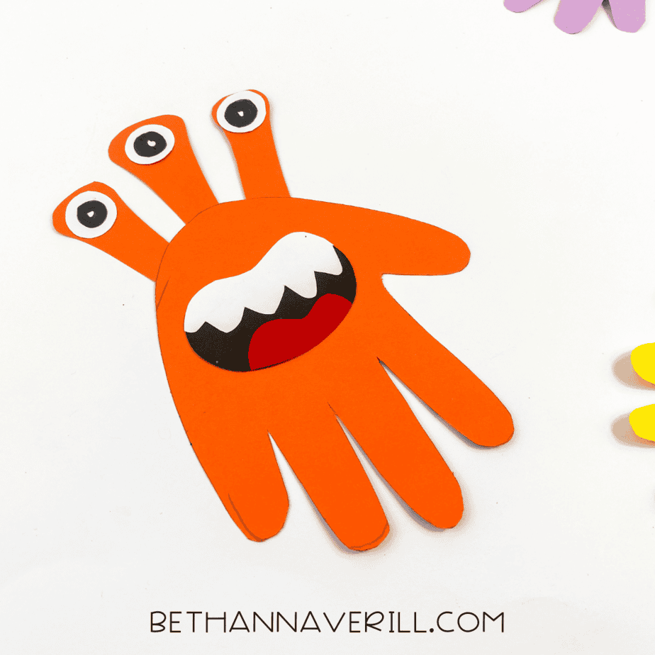 Monster handprint craft angled playfully to show detail.