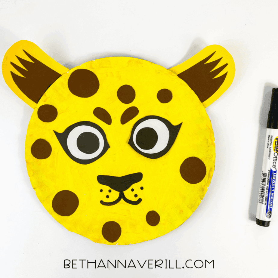 black marker used to add detail to the cheetah's face