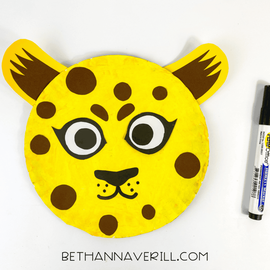black marker used to add detail to the cheetah's face