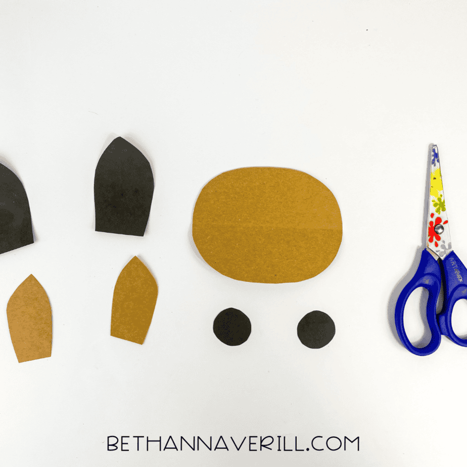 Paper cutouts for ears, snout, and nostrils