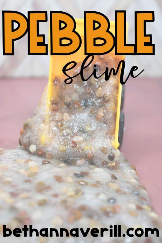 A thick, clear slime embedded with small multicolored pebbles oozes out of the back of a yellow toy dump truck. The image features the words “Pebble Slime” at the top and “bethannaverill.com” at the bottom.