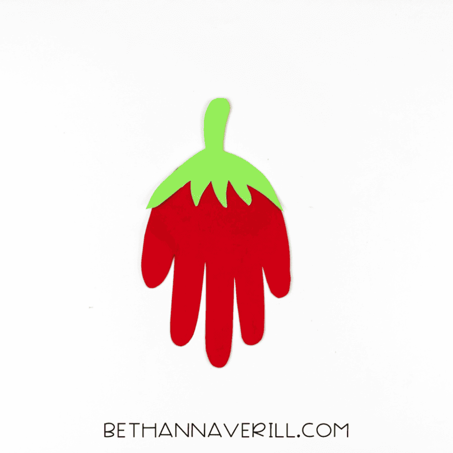Green leafy top glued to the top of red handprint