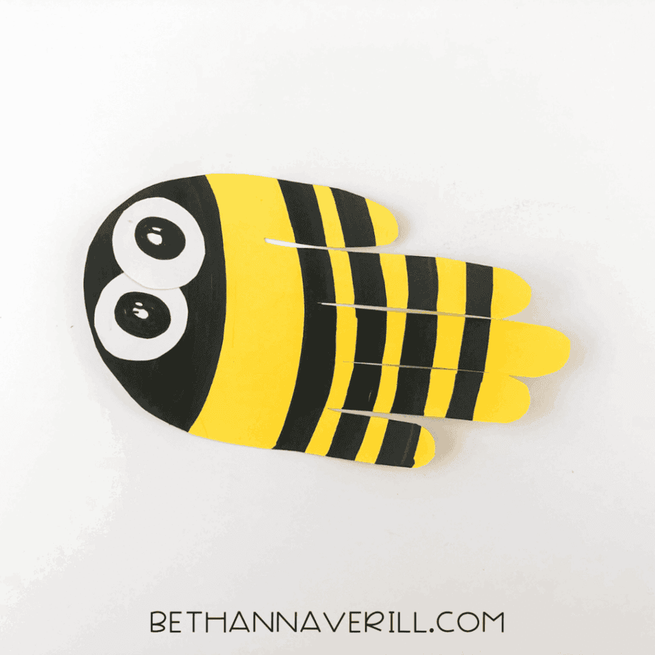 Pupils drawn onto the eyes to bring the bee to life.