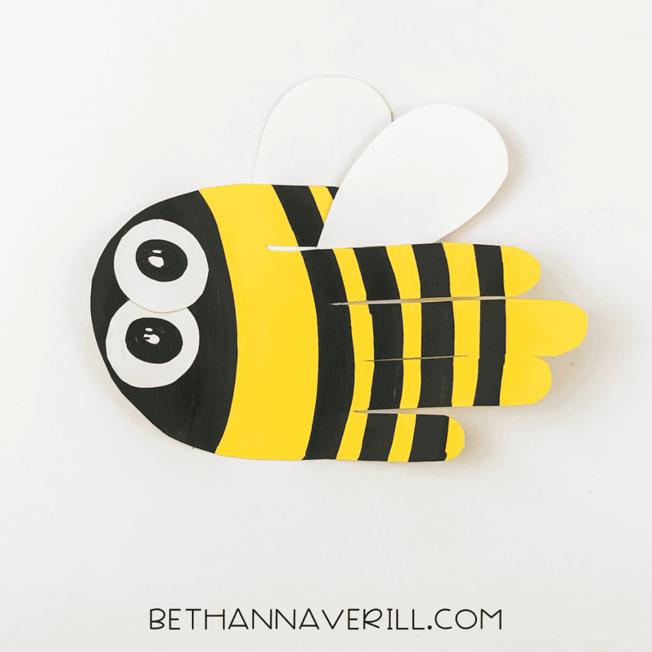 Finished bee with wings attached at the back.