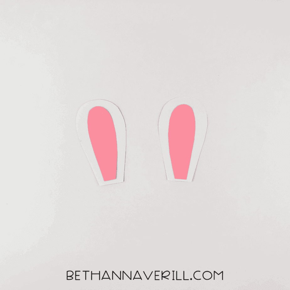 Pink inner ear glued onto the white outer ears.