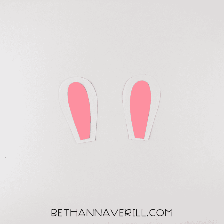 Pink inner ear glued onto the white outer ears.