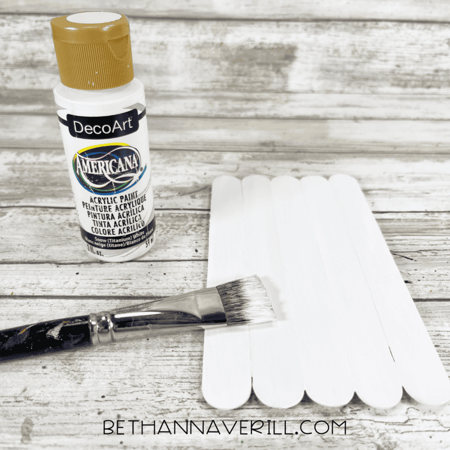 Popsicle sticks painted white with a brush.