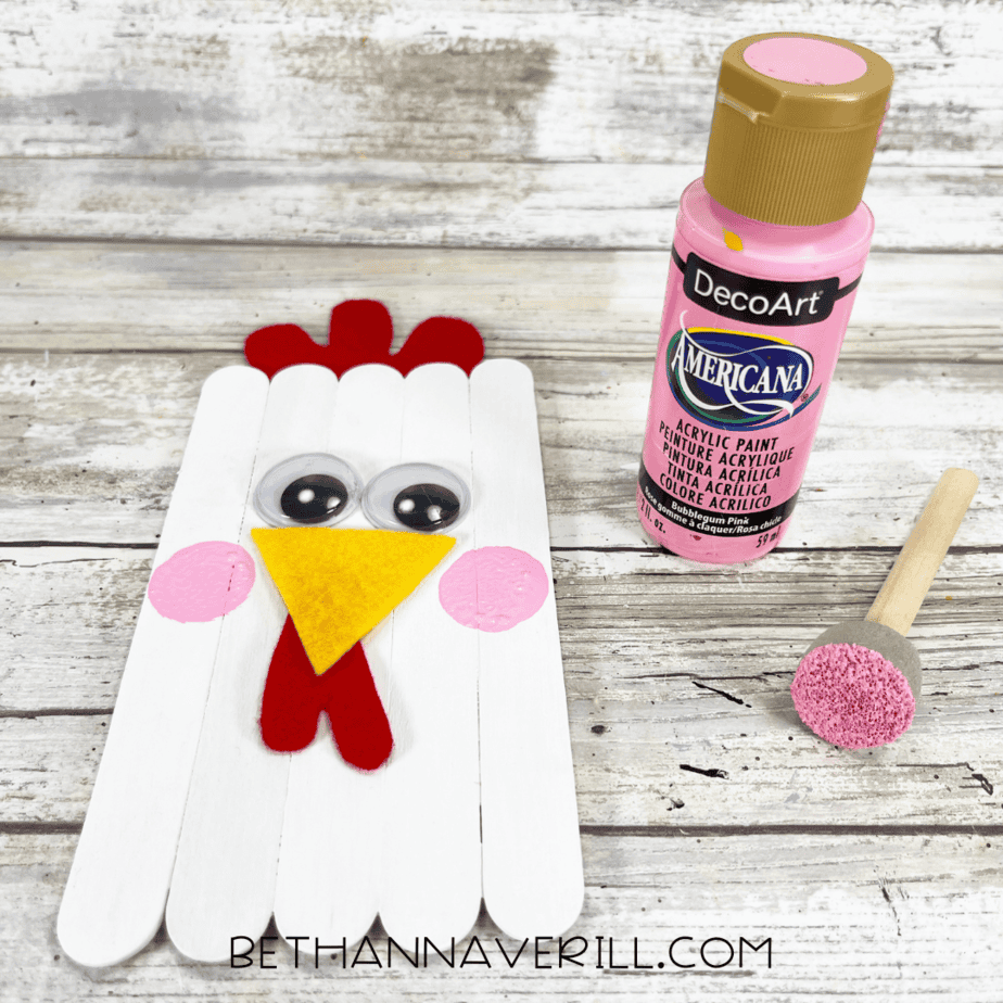 Chicken with added pink painted cheeks.
