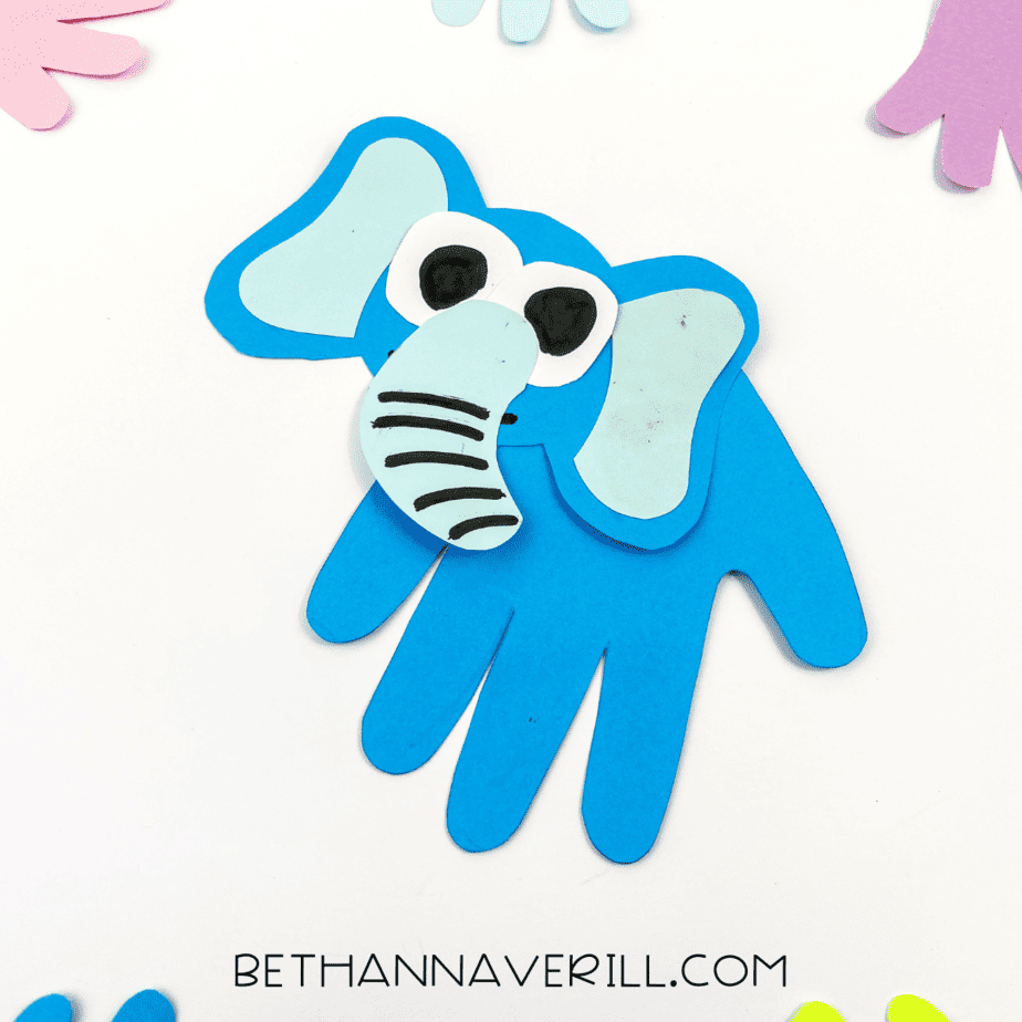 Elephant handprint surrounded by colorful handprint cutouts
