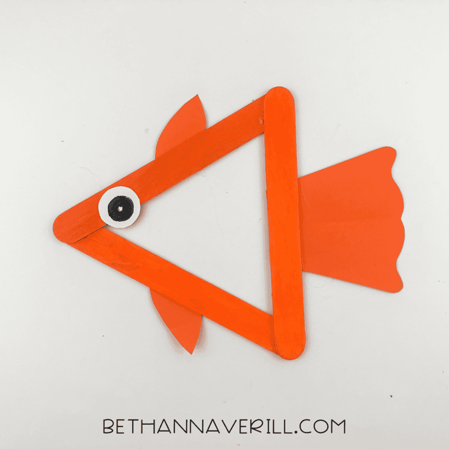 Completed fish craft with black pupil added to the eye.