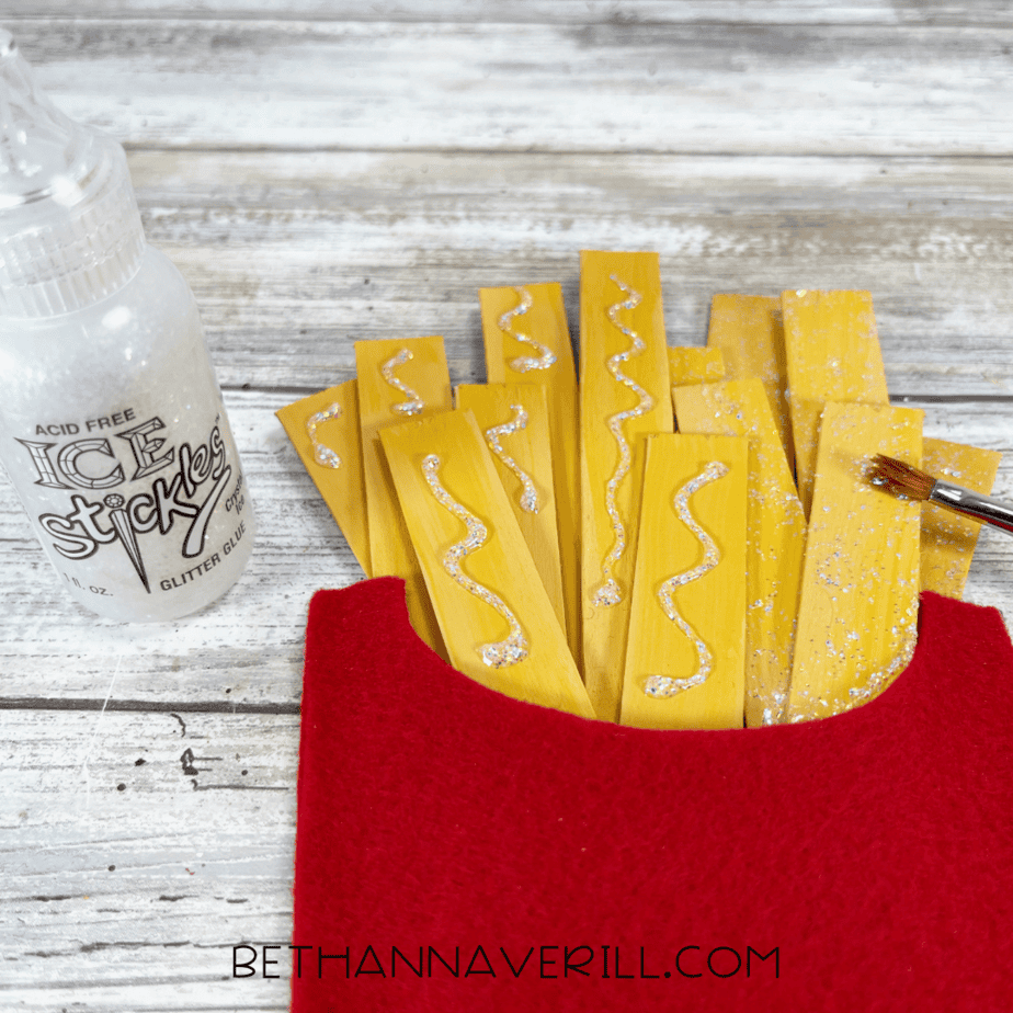 Glitter glue added to fries for sparkly detail.