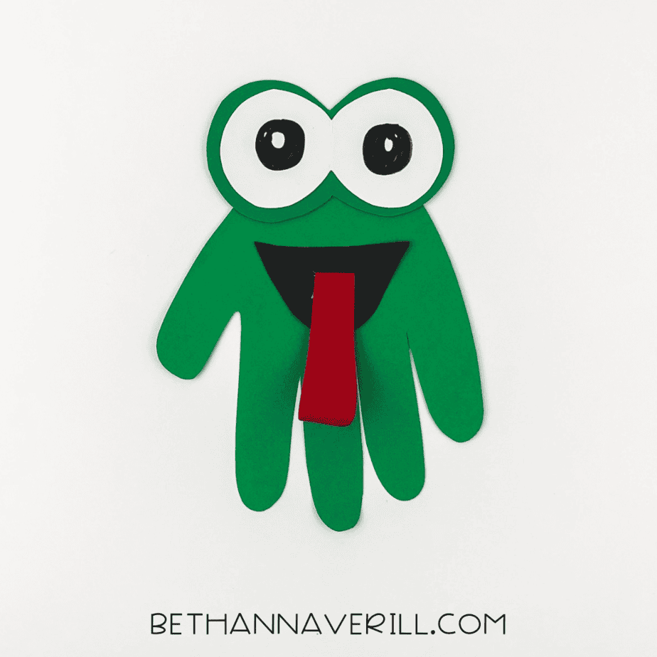 Mouth and tongue glued to the green handprint body