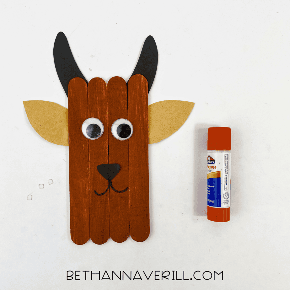 Goat craft with googly eyes glued in place, smiling face drawn with marker.