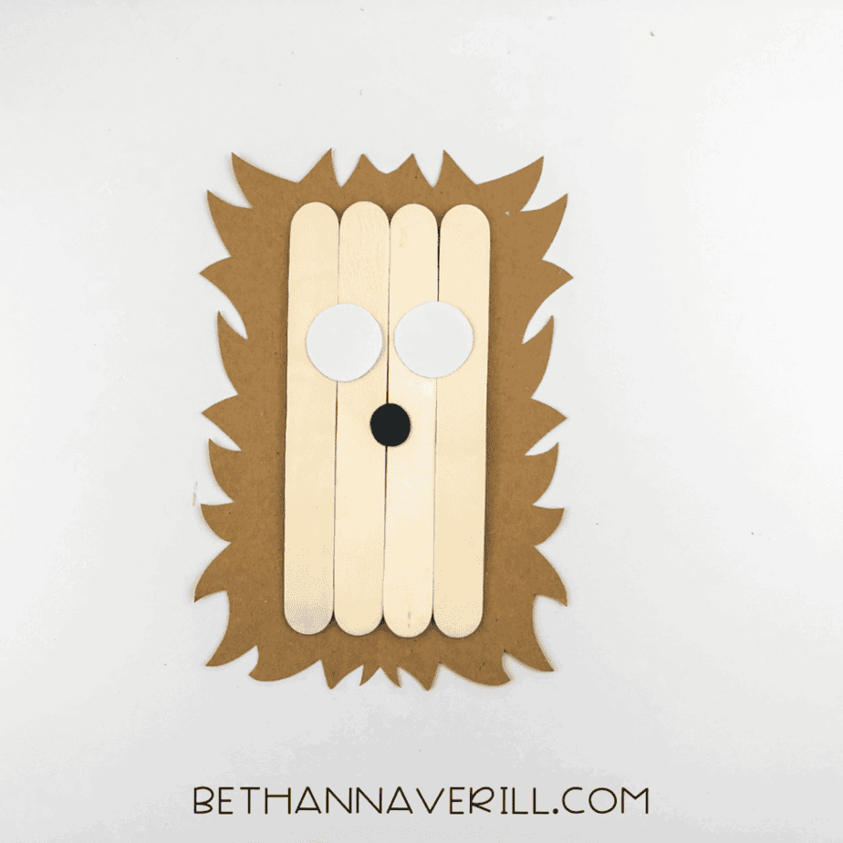 Hedgehog with glued-on white paper eyes and black paper nose.