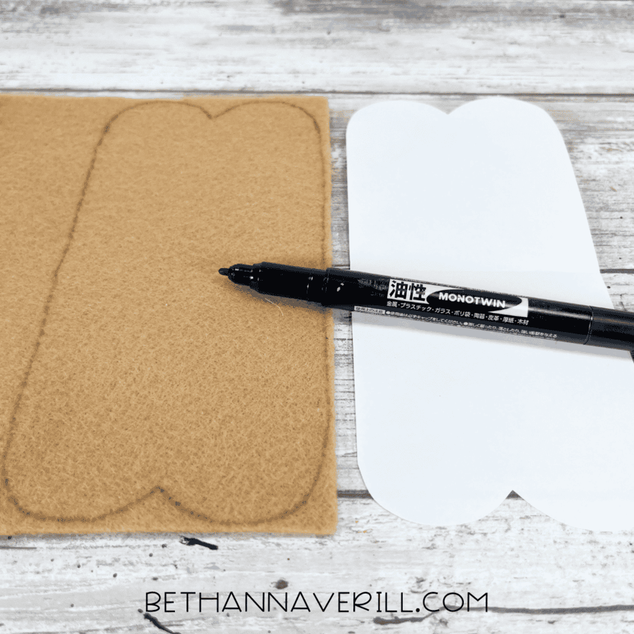 Tan felt with hot dog bun shape traced using a marker