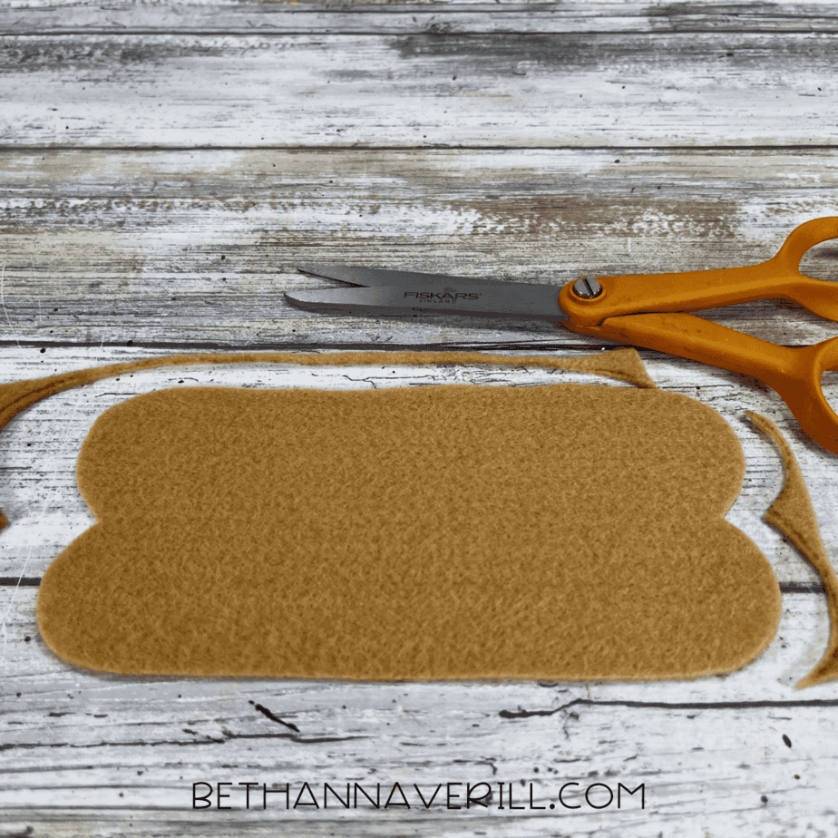 Cut felt hot dog bun piece with rounded edges