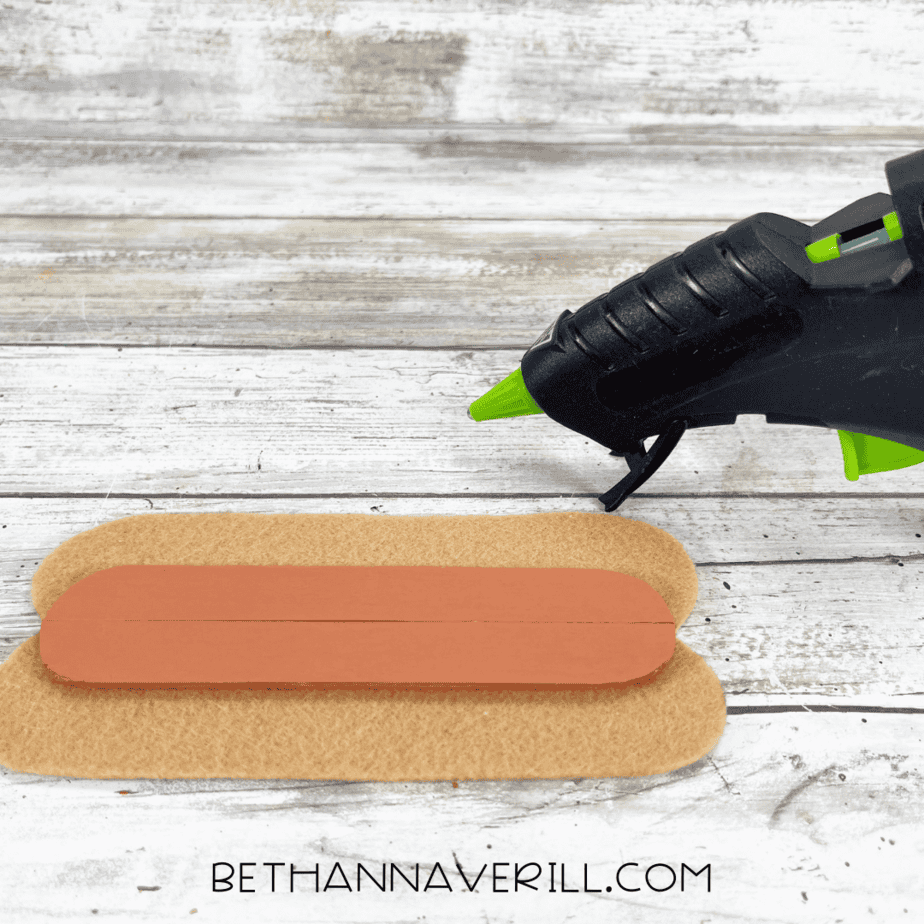 Hot dog piece glued to felt bun base