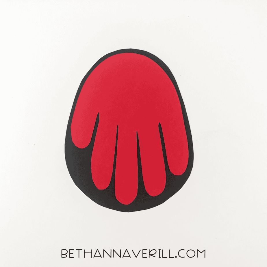 Red handprint glued onto large black body shape