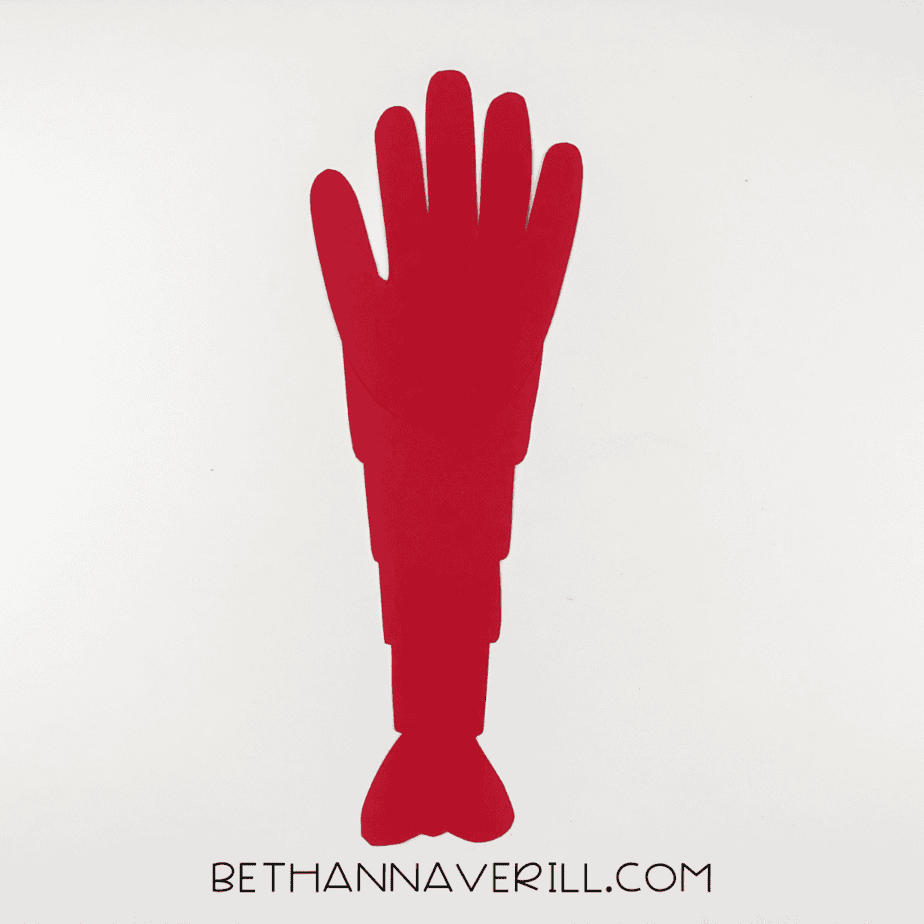 Handprint glued onto the segmented red body.