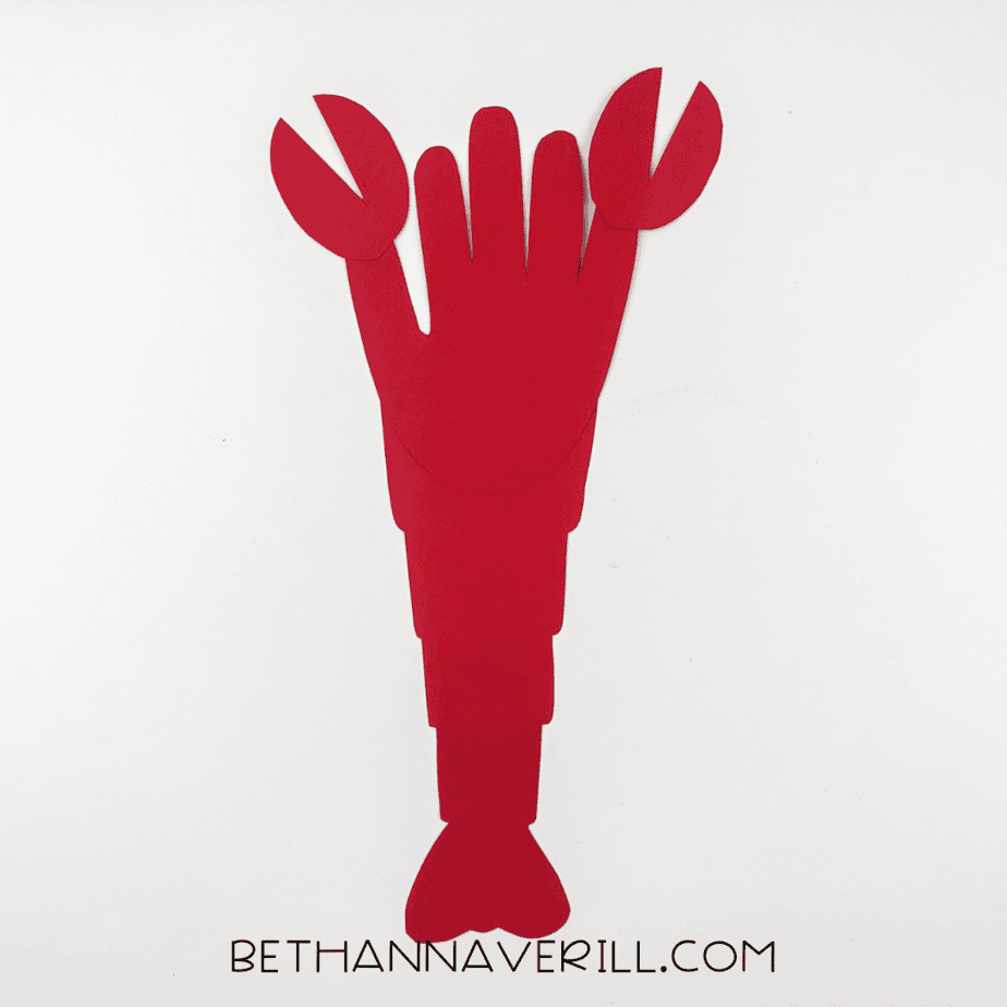 Claws attached to each side of the handprint.