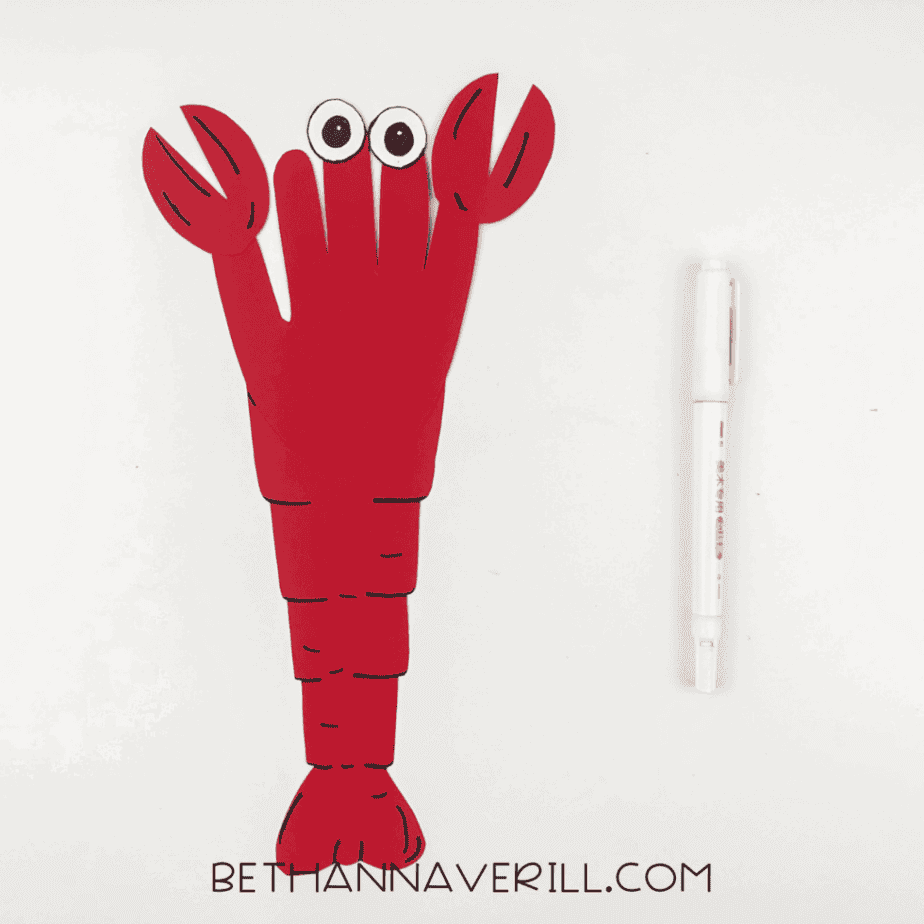 Lobster details outlined with a black marker for claws, body, and tail.