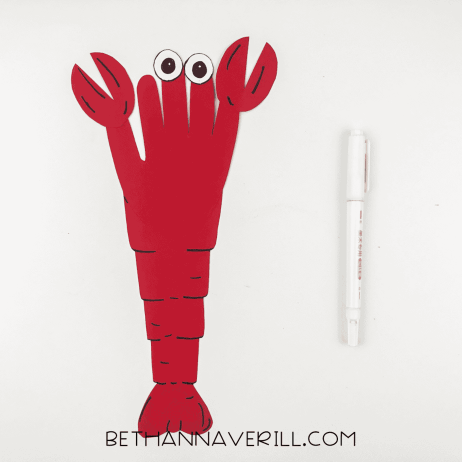 Lobster details outlined with a black marker for claws, body, and tail.