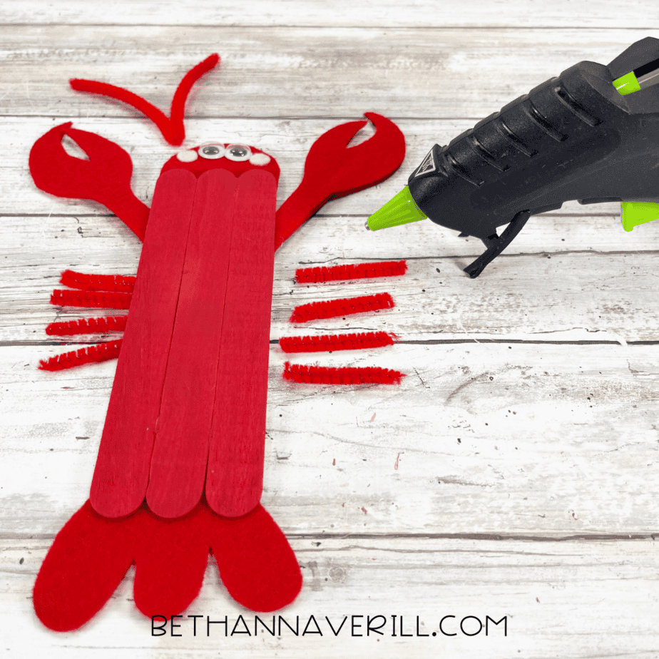 Pipe cleaner legs and antennae glued to lobster body