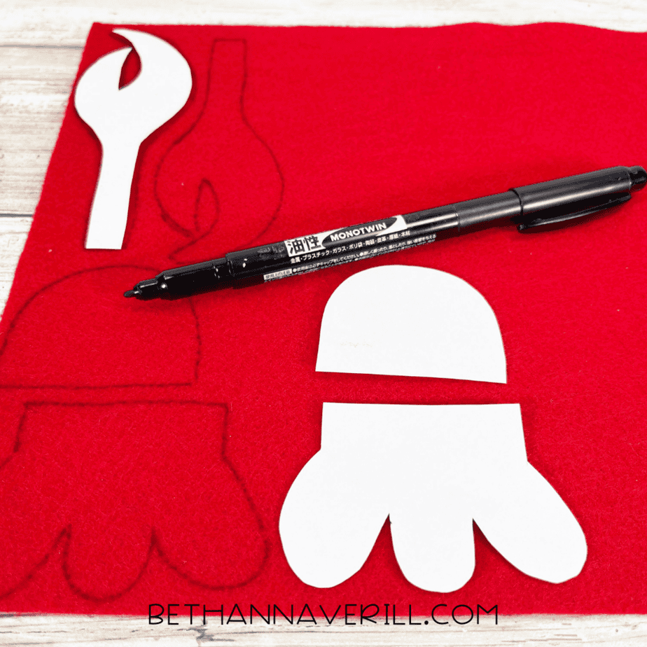 Lobster claw and body patterns traced on red felt with marker