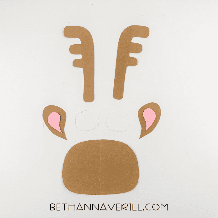 Moose ears assembled with pink inner ear glued onto brown outer ear.
