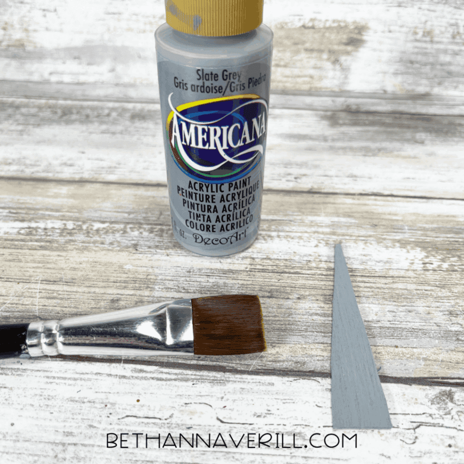 One craft stick triangle painted with slate gray paint for the tusk.