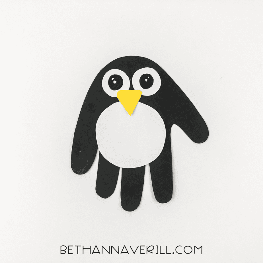 Finished penguin handprint craft ready to display