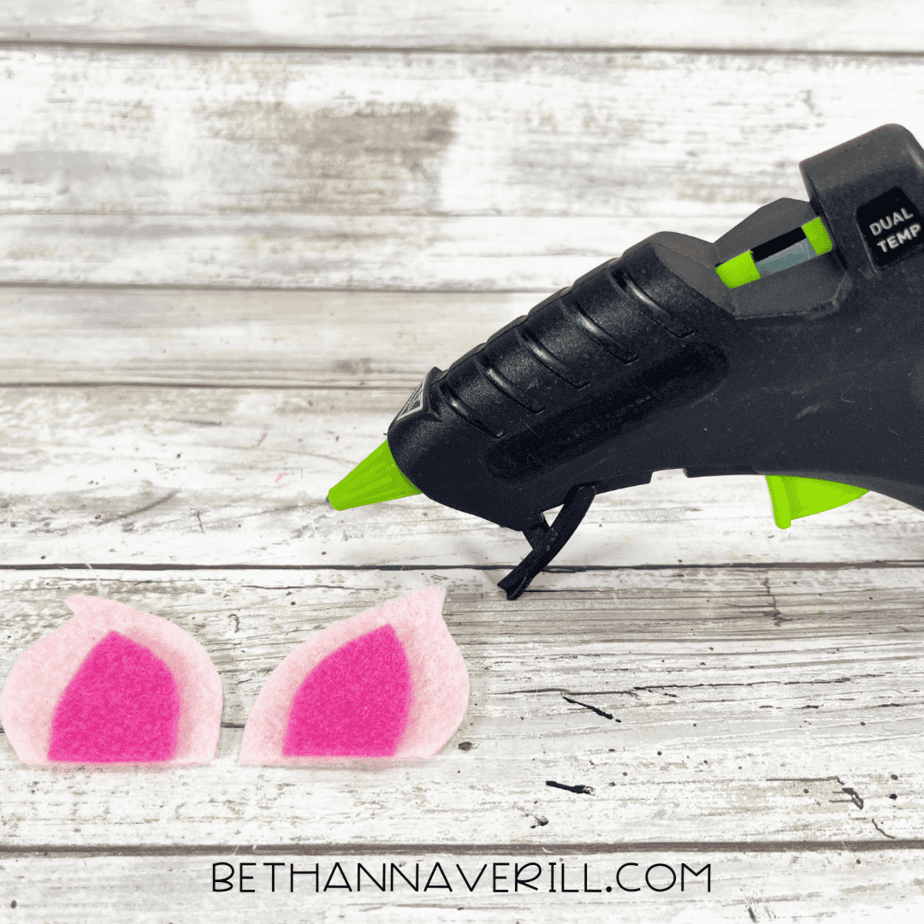 Inner and outer ear felt pieces glued together with glue gun.