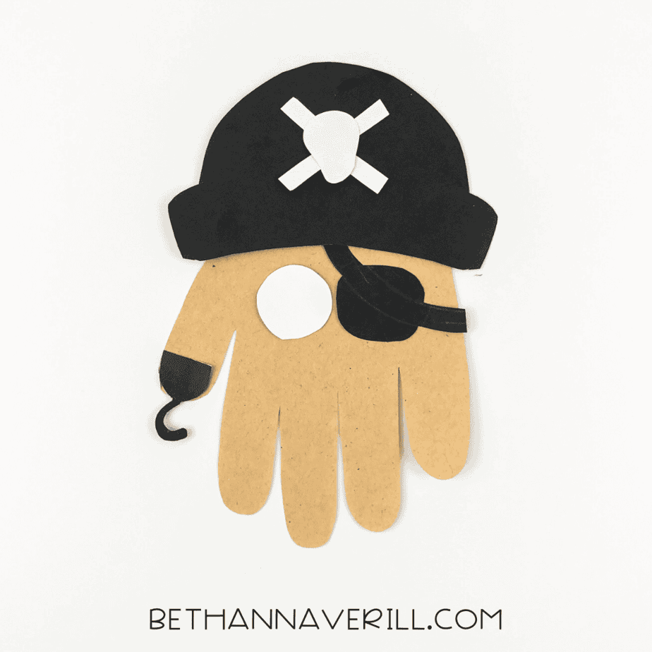 Hook arm and white eye glued onto the pirate handprint.