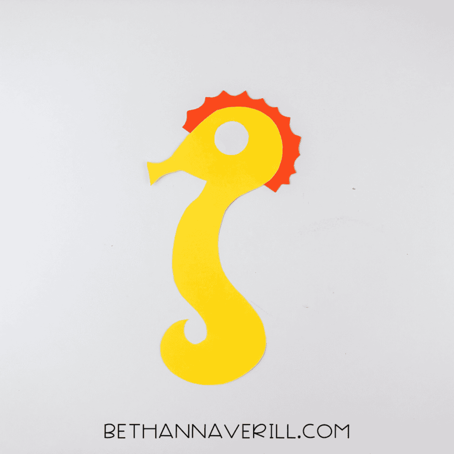 Seahorse body assembled with red crest and white eye circle.