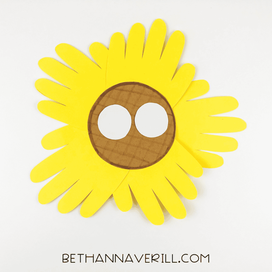 Two white eye cutouts added to the sunflower face