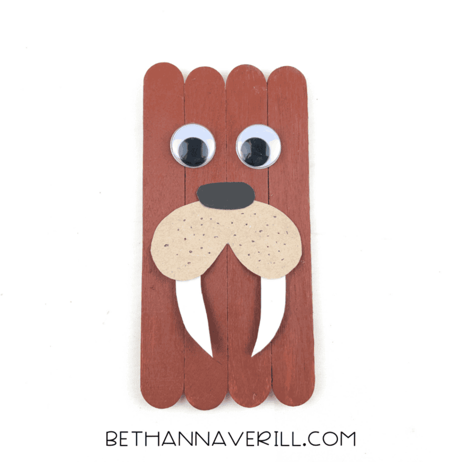Finished walrus craft with eyes, nose, snout, tusks, and marker freckles.