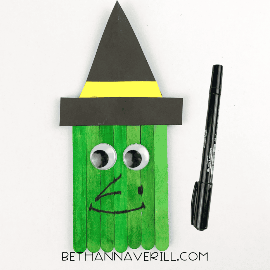 black pen used to draw on a face