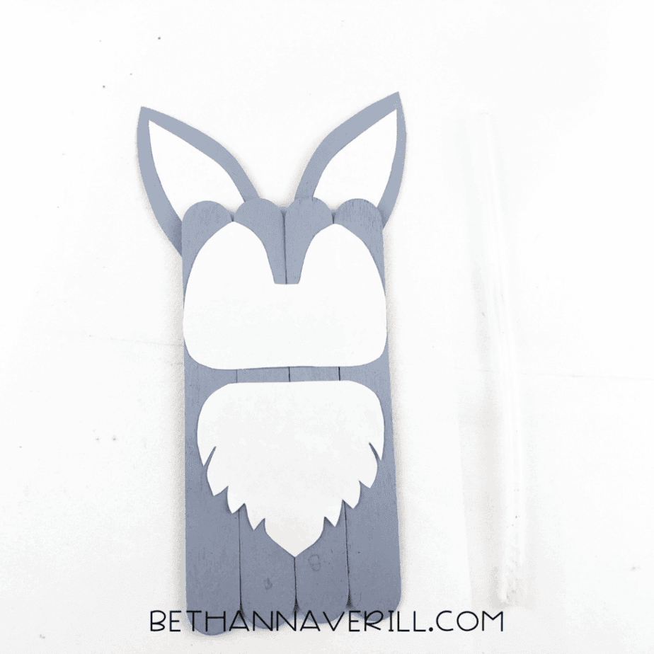 Ears glued to the top of the wolf body
